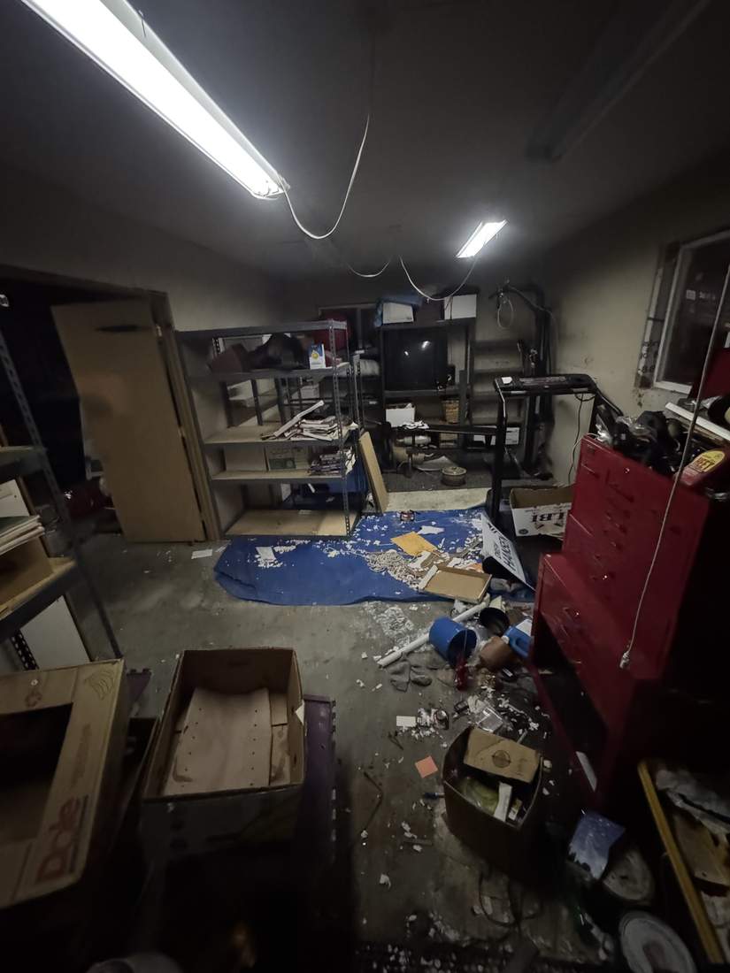 A garage partway through being cleared out